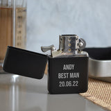 A personalised metal lighter in black metal with an engraved message