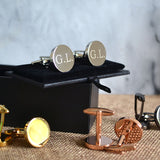 Personalised metal cufflinks in gold, silver, rose gold and black. All the cufflinks have engraved initials on the front.