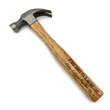 A personalised hammer with a wooden handle and steel head. 