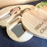 Inside a personalised cheeseboard with knives
