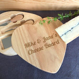 Personalised cheese board with knives in the shape of a heart