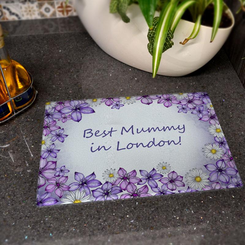 Glass chopping board with personalised purple floral design