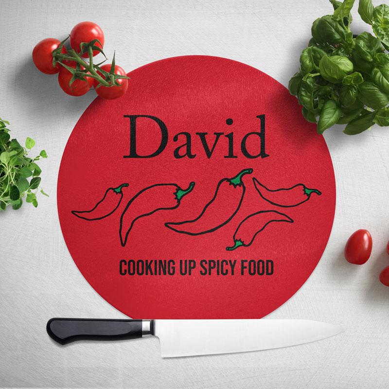 Red glass chopping board personalised with chilli design
