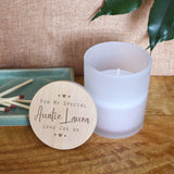 A personalised candle in a glass pot with a bamboo lid. The bamboo lid is engraved with a design featuring the words "For My Special Auntie", there is then space for you to add a name and message. 