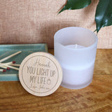 A personalised Valentine’s Day Candle with an engraved design on the bamboo lid. The design features the words "You light up my Life" and has space for you to add a name and message