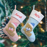 Personalised blue or pink Christmas stockings for a baby's first Christmas