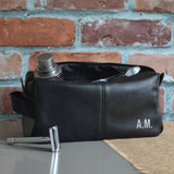 Black leather-look wash bag personalised with initials