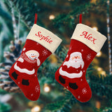 Cream and red Christmas stockings personalised with a first name