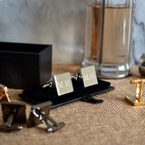 4 sets of personalised cufflinks in gold, silver, black and rose gold.