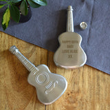 Personalised stainless steel 5oz hip flask in the shape of a guitar with the message "Happy 50th Dad! Love Alice XX" engraved on the back.
