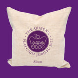 A personalised jubilee cushion with a linen cover and printed platinum jubilee emblem.