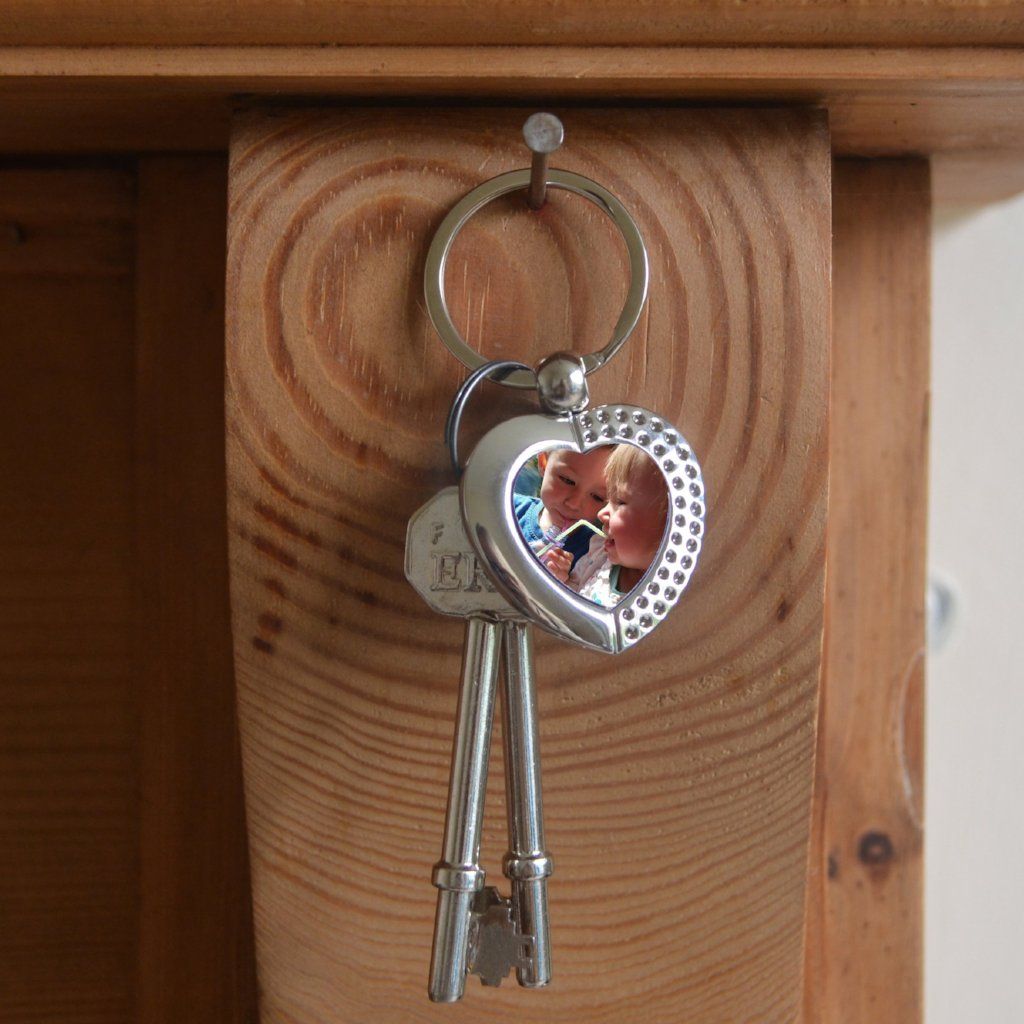 Metal heart keyring hung on hook