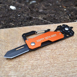 Personalised engraved multi-tool pictured in the colour orange with the message "Happy 30th Andy" engraved on to the body.