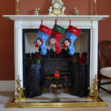 personalised child's Christmas stocking over a fireplace