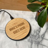 Round phone charger made from custom printed bamboo